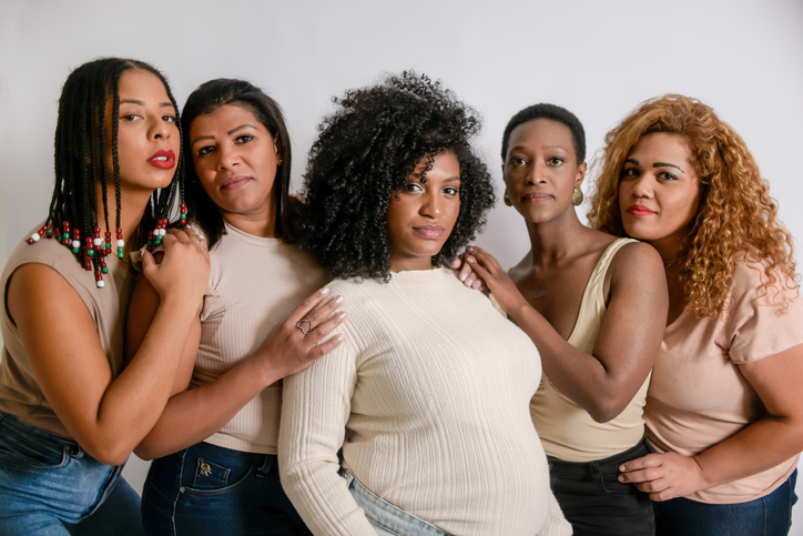 Beautiful Latin American black women on a white background